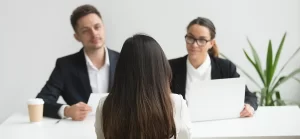 headhunters interviewing female job candidate