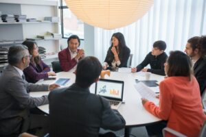 Portugal executives working on a round table discussing different topics