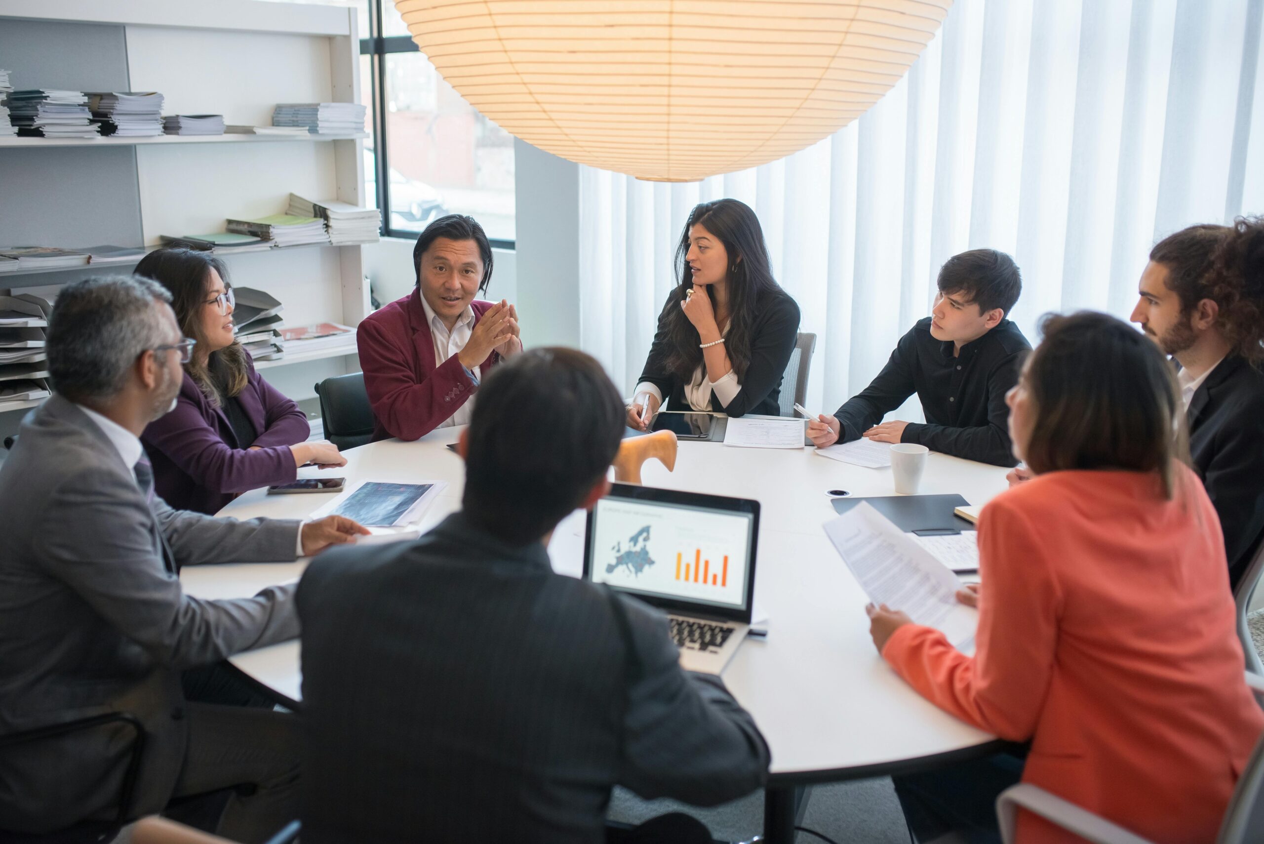 Portugal executives working on a round table discussing different topics