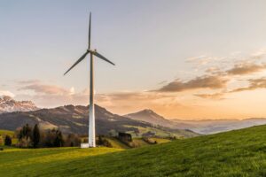 Wind turbines and solar panels in Spain symbolizing leadership in renewable energy – Zavala Civitas